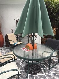 Patio table with 4 chairs and umbrella 