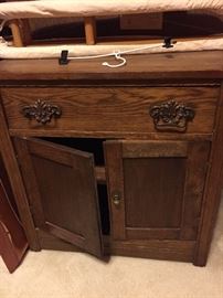 Solid wood end table or bedside table.