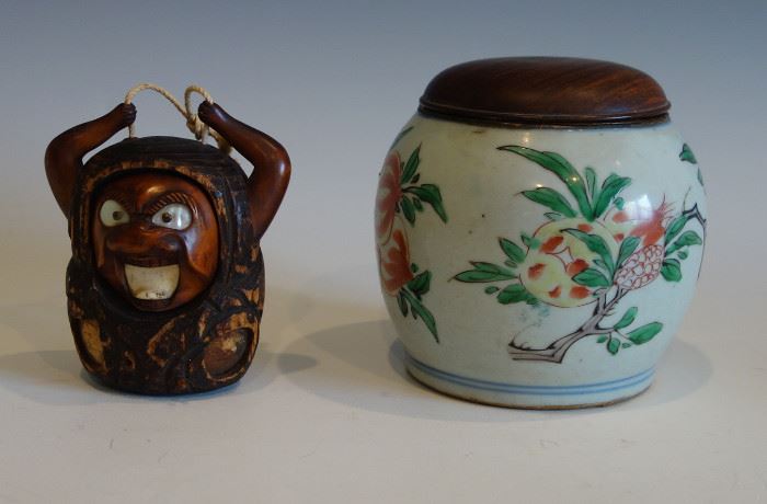 A 19TH CENTURYJAPANESE TOBACCO BOX AND A PORCELAIN BRAZIER POT.