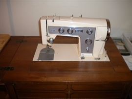 Sewing machine in cabinet