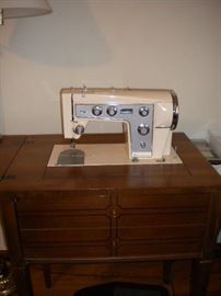 Sewing machine in cabinet
