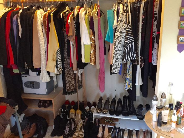 Full closet of clothing and shoes