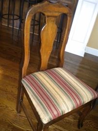 Dining room table with tile top southwest flair, 6 chairs and matching China cabinet/buffet-hutch.