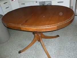 vintage oval table with greek key design trim