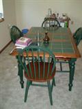 Dining table with 4 chairs and 1 self storing leaf