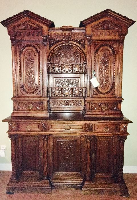 Circa 1800's ornately carved stepback-cupboard