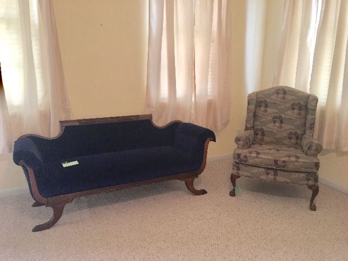 Antique sofa and golf themed chair