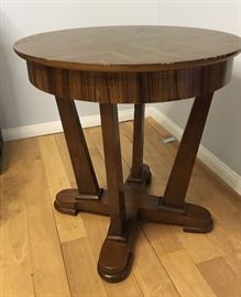 Round wooden side table