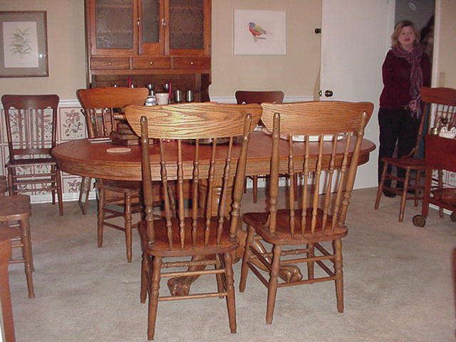 Oak table and chairs--three sets  of oak chairs, similar and compatible