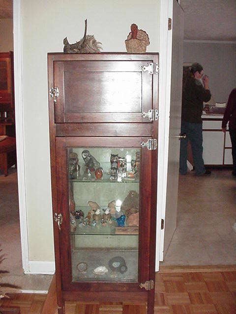 Another view of the curio cabinet/antique refrigerator