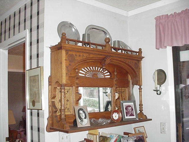 Elaborately carved shelf, Victorian era