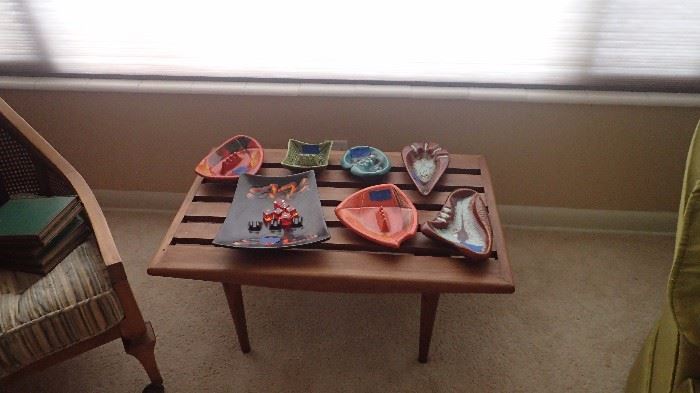 Awesome tea side table with mid century modern style ashtrays. Two great side chairs.