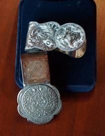 Money clips - one is Montana Silversmiths and the other is a sterling clip from Mexico