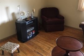 great brown side chair, nice black cabinet that could be used for different things