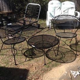 Several sets of wrought iron patio sets