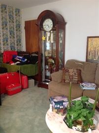 Beautiful 1960 s Howard Miller grandfather curio clock.  Working and chiming