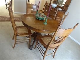 Table and Four Chairs, with additional chairs available