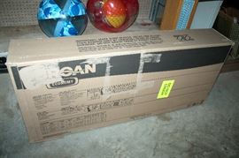 Cream color range hood in the box