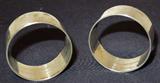 Pair of Webster Company Sterling Silver round napkin rings, approx. 1 3/4"across x 3/4" wide band, total weight, 28.7 grams.
