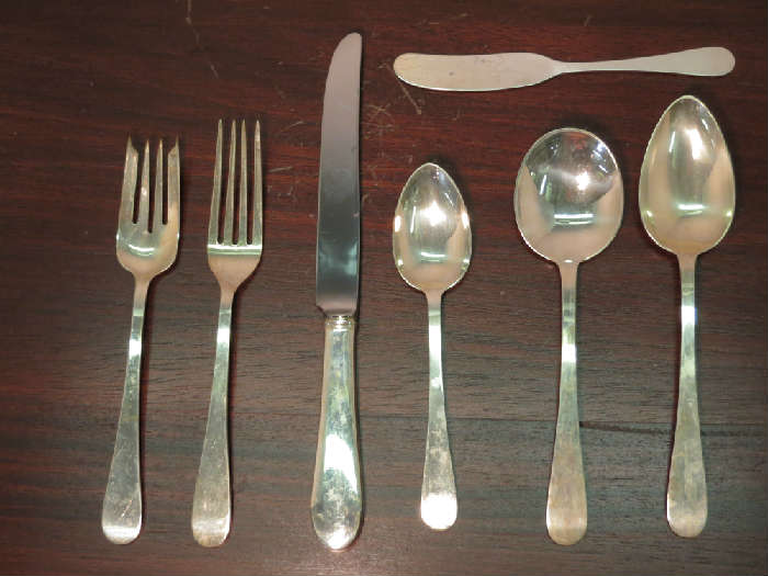 Tiffany's Sterling Silverware, 5 piece place settings for 6 include salad and dinner fork, knife, butter knife and teaspoon, two soup spoons, four serving spoons, Salem pattern, total weight; excluding knives, is 1381.4 grams, total weight of knives with sterling handles only, is 376.2 grams, all in a Pacific Silvercloth lined, wood silverware box by Eureka, approx. 4"h x 17"w x 11.5"d, has a few scratches on top and 6 individual place setting silverware storage rouge cloth bags . A little polishing would go a long way!