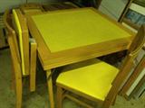 Vintage folding card table with 4 matching folding chairs (5 items total);manufactured by Ferguson Treasured Furniture, Set #6028, yellow vinyl padding on chairs; scratches on table and chairs; ink stain on table; 30 in. square