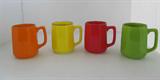 Four awesome neon looking coffee mugs marked "Japan". May need cleaning