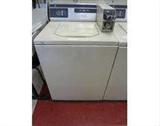 GE Commercial, single load, top load, coin operated washing machine. Currently in use and operational. Can be modified for normal home use. Buyer responsible for removal.