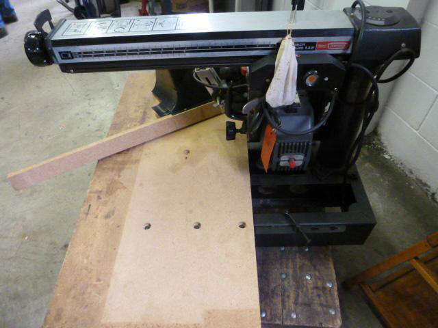 CRAFTSMAN 10 INCH Radial Arm Saw with stand, however it does not have a table stand. Includes Craftsman vacuum attachment. Key included, it is in working condition. Previously Used