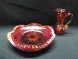 Amberina crackle glass pitcher with an applied handle. The pitcher is red, the handle is yellow. There is a pontil on the bottom. The piece is not marked. Also, Ruby Red Diamond Pattern Candy Bowl Dish-Scalloped Edges. In good condition, no chips or visible scratches.