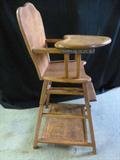 Vintage Wooden Baby High Chair - Solid Maple with Wooden Tray and Foot Rest. The chair is foldable for storage. This chair would be Non-Compliant for use with a child, there is no safety strap. It could be used as a decoration or for dolls. (Approx. 39.5 tall x 18 x 18) It appears to have the normal signs of use but not abuse. Previously Used