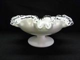 Vintage milk glass footed silver crest ruffled/crimped edge bowl, believed to be Fenton. (Approx. 8.5 x 4) No manufacturer markings visible and No chips, cracks or crazing are observed. There was a period when Fenton items were marked by the Fenton sticker and not stamped into the glass.