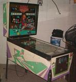 Williams "Solids N Stripes" Pinball Machine Designed by Norm Clark, Art by Christian Marche.   This was Fun to Play (I had to make sure it was working well, right?)  Notable Features: Flippers-2, Pop Bumpers-5, Kick-Out Holes-6, Standup Targets-2, Center up-post. The ball sometimes hesitates in the Kick-Out Hole on the Right Side, if you nudge the machine it pops right out. Overall good condition considering Age and Use, I am by no Means an Expert on Pinball Machines Please preview this great "Blast from the Past"