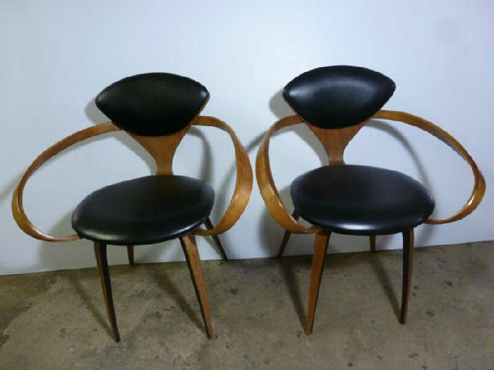Plycraft Pretzel Chairs, very rare - Eames Era - 60's!  Plycraft tag on bottom on one chair. Plywood Walnut Veneer, Black Vinyl Satin, Original foot glides. Minor signs of use/age. Chairs are super sturdy. All original finish and upholstery. No rips, wood repairs or punctures in upholstery. No repairs of any wood areas are visible. (Approx.  27" Width x 23" Depth x 31" Height / 18" Seat Height).