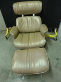 Fabulous Mid-Century Modern Leather (Eames-Era) Lounge Chair with Ottoman - Light Brown color supple leather in very good condition. There is no label from the maker. (Approx. 32W x 20D x 39H, Seat 15H, Ottoman 21W x 16D x 14H)  Minor wear, Lightly used. There is an issue with one arm; a screw has been stripped and the wood rubbed, making the arm a little loose; Picture will show where someone has tried to fix the problem. Some of the black paint has chipped from the underside of the ottoman hardware, and a few small places on the edge of the ottoman; but that does not take away from the beauty of the piece.