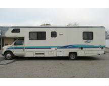 1995 Hornet 30ft. class-c motorhome made by Damon. It only has 43,000 actual miles. This easy-to-drive Class-C has these features: It sits on a Ford E-350 chassis. has a gas engine, RWD automatic transmission, dual rear wheels on chrome simulators, the tires are in good condition, woodgrain dash accents, power steering, am/fm cassette stereo,cruise control, tilt wheel, cloth interior. The coach section has a Flexsteel conversion package which includes a Kohler Confidant generator, Norcold refridgerator, Wedgewood stove/oven, Audiovox microwave, queen size bed, mauve color scheme with good carpet throughout. When I started it it started right up with no smoking, knocking or unusual noises other than a belt that may need tightened up. Cosmeticly it has some minor damage on the passenger side rear corner as shown in the photos. It also has a couple small cover doors missing which should be readily available at a local RV dealer, some minor stripe peeling and a scrape as shown. The caulkin