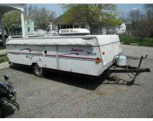 1998 Jayco Eagle 12 UDK Pop-Up Camper

12-foot trailer that features plenty of storage and space. This trailer can sleep up to seven.
 
VIN - 1UJAJ01GXW1FM0913

Needs repair or use for Parts. Canvas is mildewed and needs some repair. Inside of camper has had some water damage. Cushions, Curtains and Cabinets are in good condition but need a little cleaning. The tires do hold air but have no idea how old they are.  Upon opening the camper, the cable lifting system broke on one side and we were not able to fully open the top. One of the supports also jammed and we can no longer close the camper completely. We have no idea if the Coleman Air Conditioning Unit works or not. Could be restored to usable condition or possibly gutted and used as a trailer. Please see all pictures for current condition.