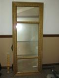 Very nice frame mirror. Three panels. Frame in very good condition. Mirror just needs cleaning. Measurements are 61 inches long and 24 1/2 inches tall. (Pictures show mirror on a side edge.)