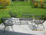 Back Yard Patio furniture - Wrought Iron all the way. Two of the chairs have a very nice arm design (see pictures), how many of you have seen a Rod Iron Rocking Chair? Here is a really nice one. Also included are 4 metal tables and one Rod Iron Coffee Table.