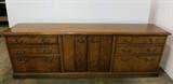 Kimball credenza with center storage cabinet and three drawers on each side, bottom drawer is file drawer, very solid piece, approx. 30"h x 7ft 5"l x 19"d, does have nicks and scratches on top and on finished back side, a few chips too.