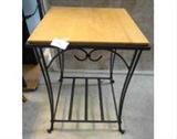 Longaberger brand end table with metal base. Good condition and measures 16.5 square on top and 24 inches tall.