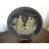 Plate by Incolay Studios of California from artist Alan Brunettin. 3-D image crafted in Incolay black onyx cameo stone. "The Judgment of Paris" measures about 8 inches across and includes storage box, certificate of Authenticiy and literature. No apparent damage. Plate stand NOT included.