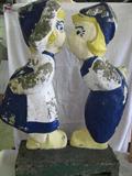 Vintage Lawn Statue - dutch boy and girl kissing- these are very old and were found buried in debris in the woods. A Great find, great condition considering their age and lovely!