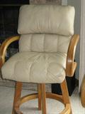 2 Douglas Furniture Mexican leather bar chairs. 41x24x20. Seat 25"h. 1 arm detached. Can be repaired. Very comfortable.