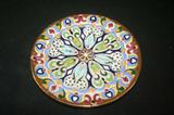 This beautiful vintage (believed to be pre-70's) plate was hand made in Sevilla, Spain in traditional Moorish design with 24K gold detailing.  The original red paper label is still attached (see photos). These plates are created by the craftsmen at "Ceramicas Sevilla" made with the same ingredients and processes used by the Ancient Moors over 600 years ago, no two are alike making them true works of art prized amongst many collectors.
