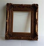 Frame that could be used for Picture or Mirror. This is a beautiful stylish frame that would look great over a fire place. Measures roughly 44 inches long X 37 inches wide. Window area for a picture or mirror measures roughly 23.4 inches long X 19.5 inches wide.
