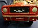 Rare Vintage 1964 1/2 Mustang Dealer Promo pedal car. In 1964  when the Mustang was introduced each Ford dealer received a pedal car as a promotional item. This car is one of the originals, it is NOT  a reproduction. This Mustang pedal car is in very good original condition considering its age. The color is still vibrant, the windshield is in very good condition, NO CRACKS, but there is a little spot of paint on the hood as you can see in the picture, the vinyl seat is still in tact just a tiny tear on the edge, and two of the hub caps are missing. The steering wheel is broken on the lower section. The Mustang decals are still attached in very good condition. Please see pictures for more info.