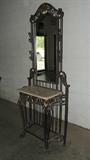Wrought iron Vanity with 4 hat/wig hooks. Gold toned detail through out. Marble styled vanity top. Measures 79 H x 32 W x 14 D. Excellent condition!
