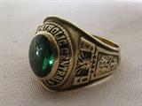 1969 Guernsey Catholic Central Senior High School 10 K yellow gold Men`s class ring weighing 10.86 grams with emerald colored stone. Please see photos.