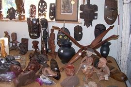Large selection of African figures and masks