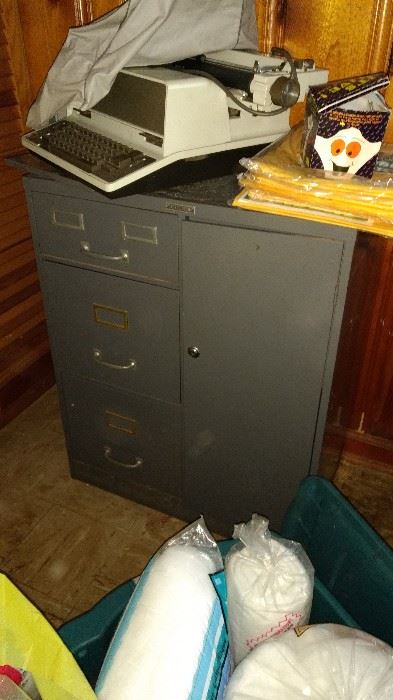 Still organizing stuff but wanted to snap a picture of this file cabinet.  Behind the door is a safe. Made by Sears.
